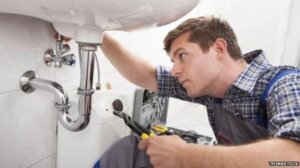 London plumber fixing hand basin sink waste pipes