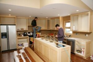 Professional kitchen fitter installing new kitchen