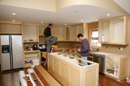 Professional kitchen fitter installing new kitchen